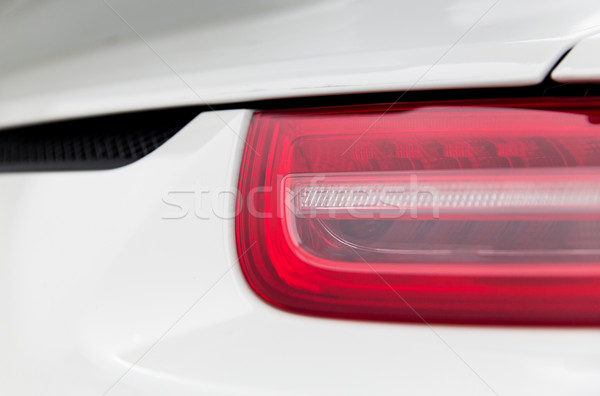 close up of car part with grille and headlight Stock photo © dolgachov