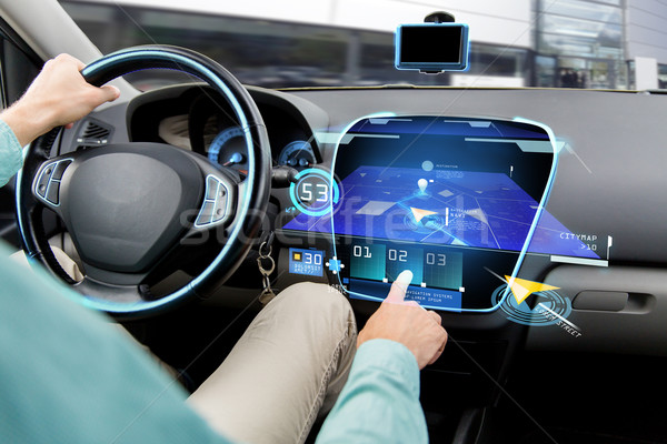 close up of man driving car with navigation system Stock photo © dolgachov