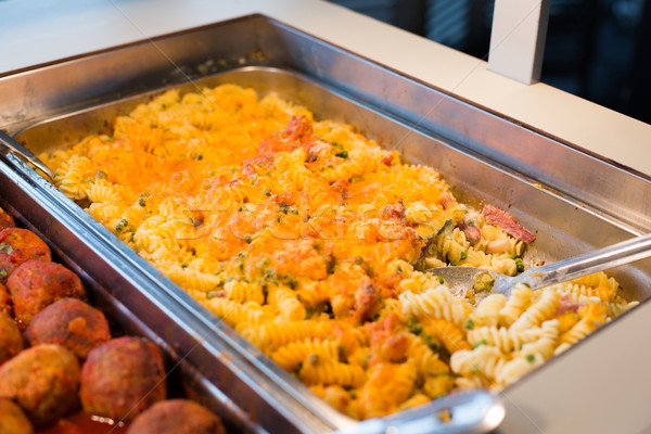 close up of pasta and meatballs on catering tray Stock photo © dolgachov