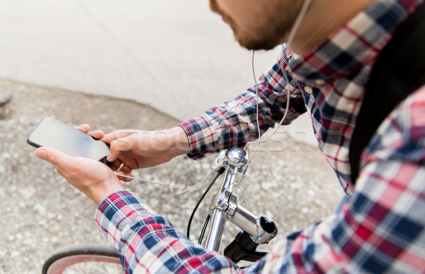 Om smartphone bicicletă oameni Imagine de stoc © dolgachov