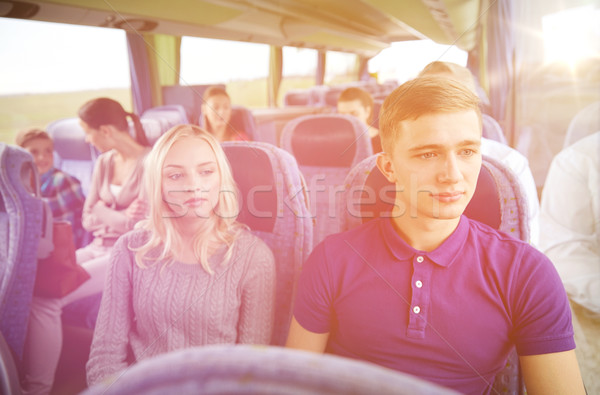 couple or passengers in travel bus Stock photo © dolgachov