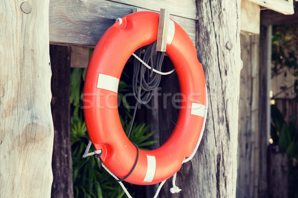 lifebuoy or life preserver hanging on rescue booth Stock photo © dolgachov