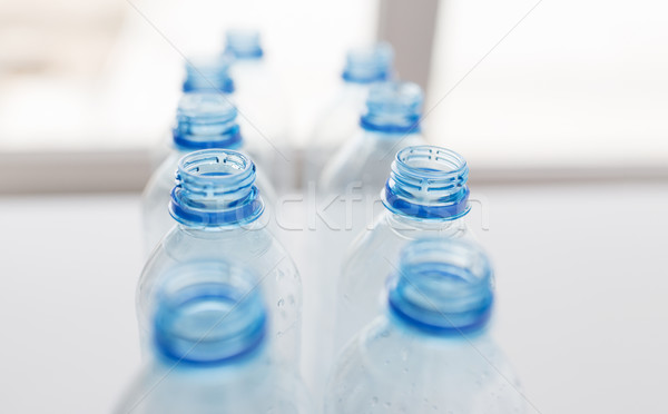 close up of empty used plastic bottles on table Stock photo © dolgachov