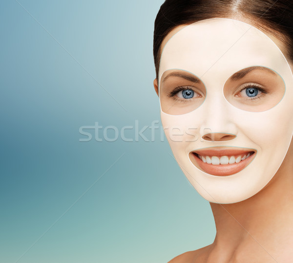 close up of woman with collagen facial mask Stock photo © dolgachov