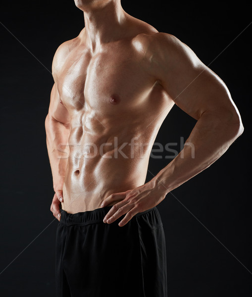 close up of man or bodybuilder with bare torso Stock photo © dolgachov