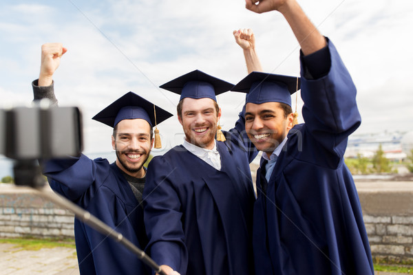 Stockfoto: Gelukkig · mannelijke · studenten · afgestudeerden · onderwijs