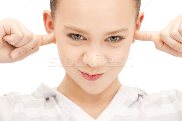 十幾歲的女孩 手指 耳朵 圖片 女孩 學生 商業照片 © dolgachov