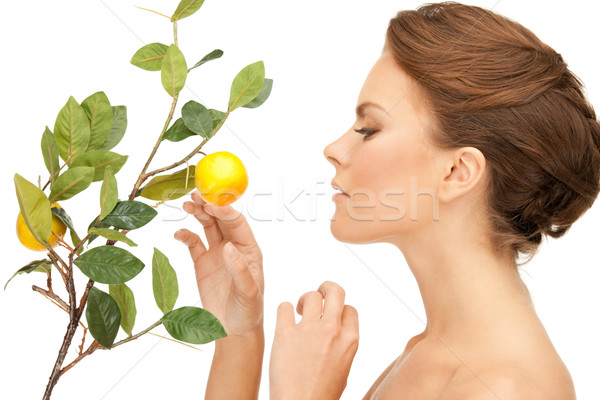 [[stock_photo]]: Femme · citron · brindille · photos · visage · fruits