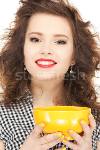lovely housewife with cup Stock photo © dolgachov