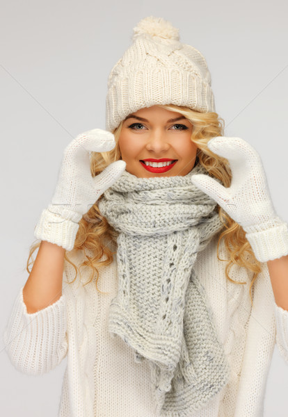 beautiful woman in a winter clothes showing heart Stock photo © dolgachov
