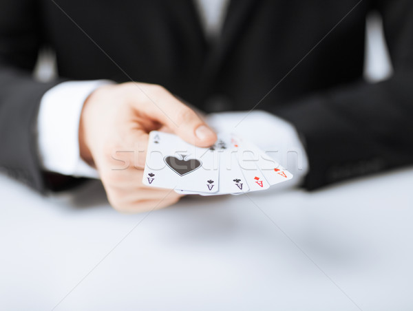 Stock photo: man hand showing four aces