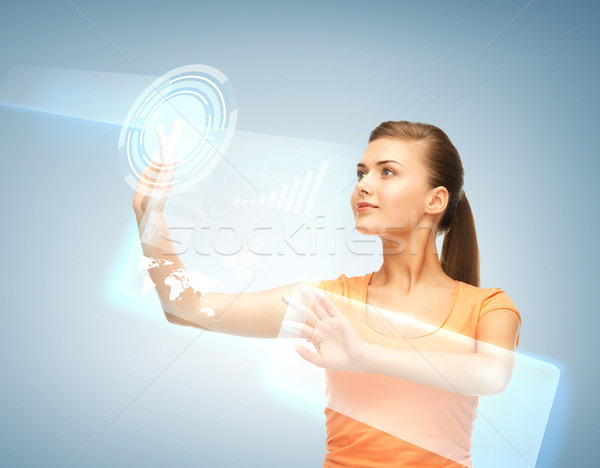 woman working with virtual screen Stock photo © dolgachov