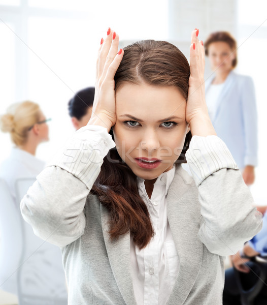 stressed businesswoman in office Stock photo © dolgachov