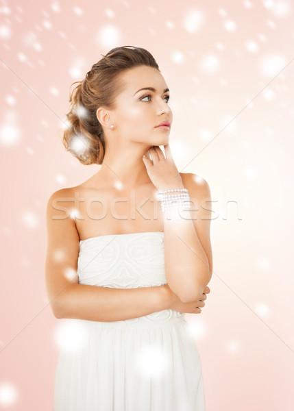 женщину Pearl браслет ювелирные роскошь Сток-фото © dolgachov
