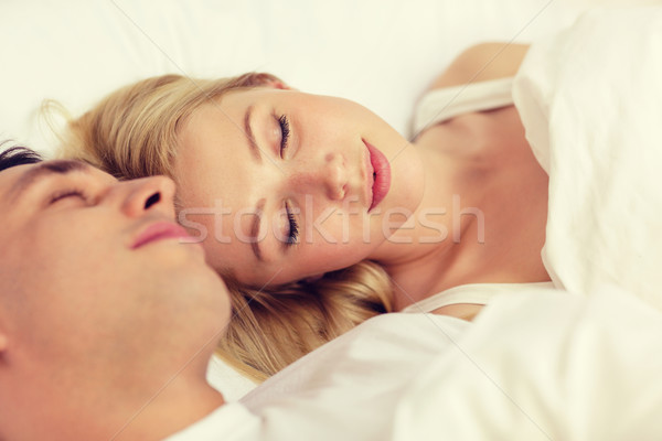 Mutlu çift uyku yatak otel seyahat Stok fotoğraf © dolgachov