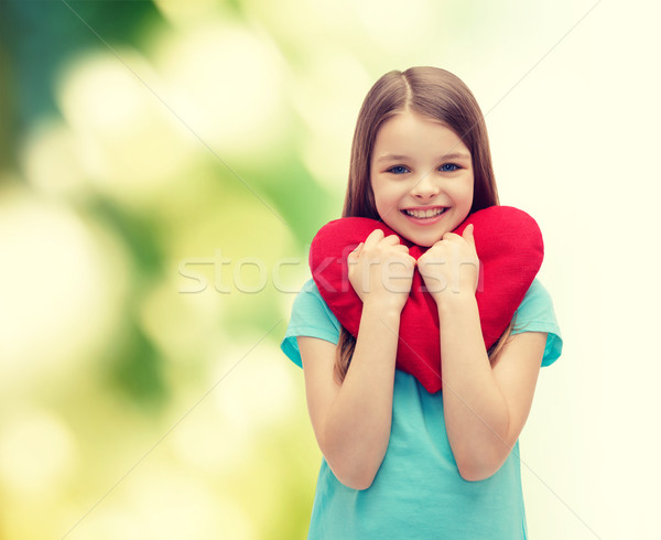 Sorridere bambina rosso cuore amore felicità Foto d'archivio © dolgachov