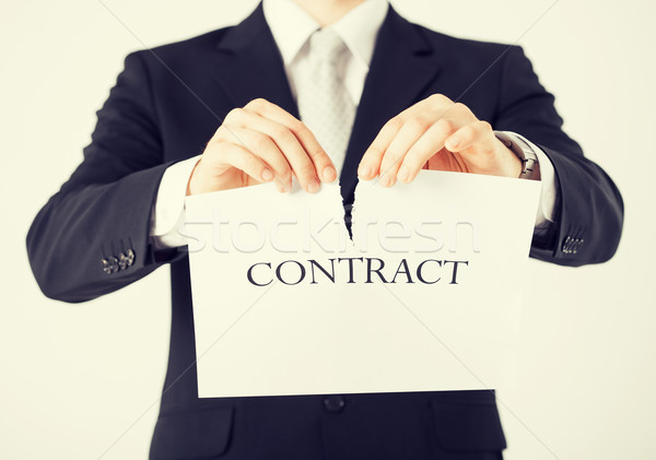 man hands tearing contract paper Stock photo © dolgachov