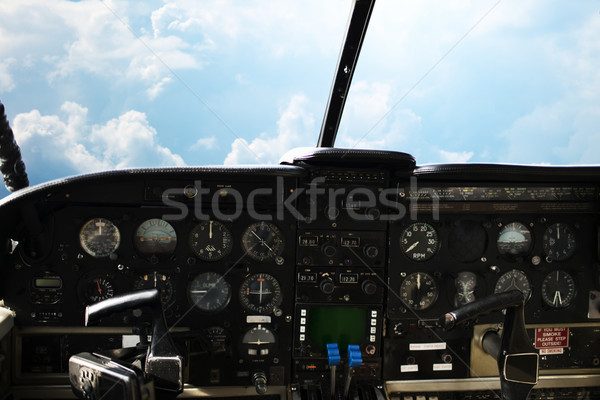 dashboard in airplane cockpit and view of sky Stock photo © dolgachov