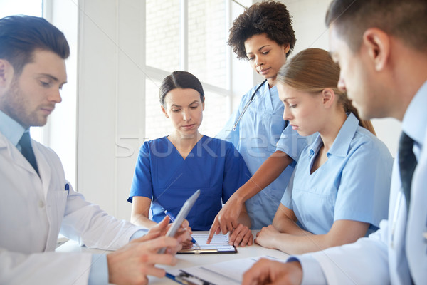 group of doctors meeting at hospital office Stock photo © dolgachov