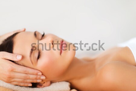 beautiful woman in spa salon having facial Stock photo © dolgachov