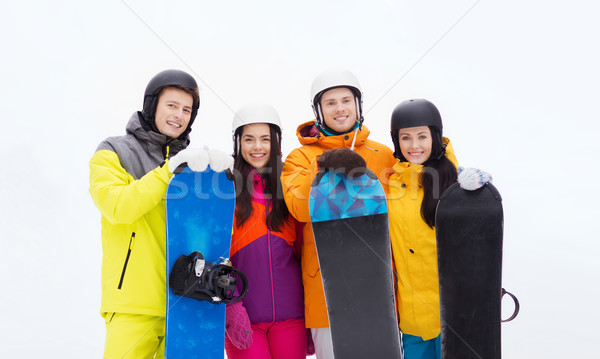 happy friends in helmets with snowboards outdoors Stock photo © dolgachov