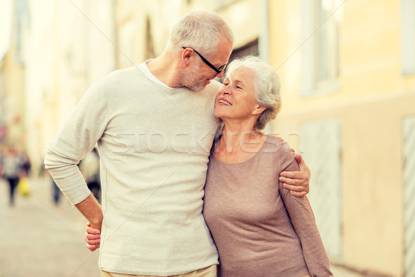senior couple on city street Stock photo © dolgachov