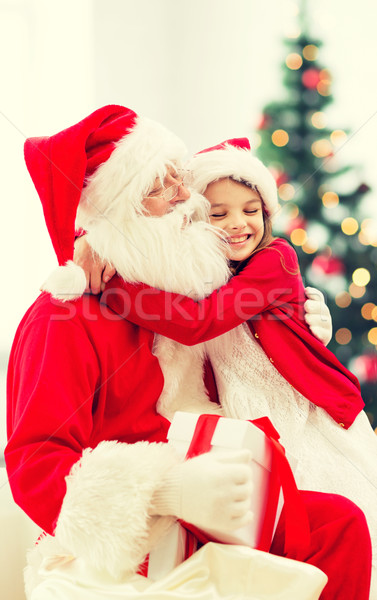 улыбаясь девочку Дед Мороз праздников празднования детство Сток-фото © dolgachov