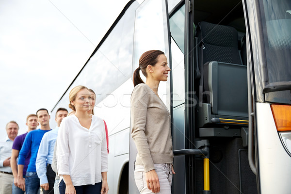 Gruppe glücklich Passagiere Einschiffung Reise Bus Stock foto © dolgachov