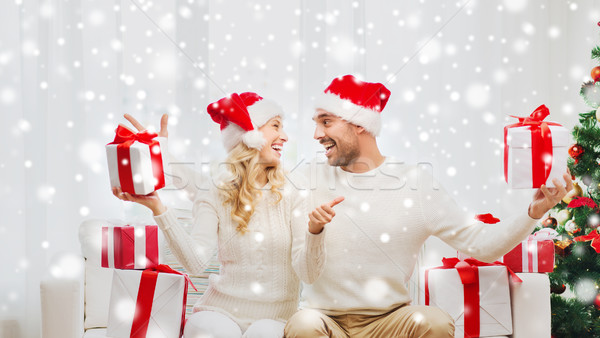 [[stock_photo]]: Heureux · couple · Noël · cadeaux · vacances