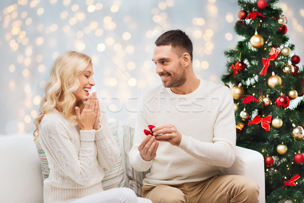 Człowiek kobieta pierścionek zaręczynowy christmas miłości para Zdjęcia stock © dolgachov