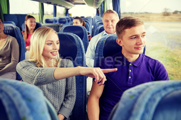 group of tourists in travel bus Stock photo © dolgachov