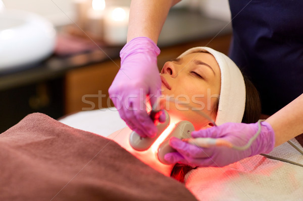 young woman having face microdermabrasion at spa Stock photo © dolgachov