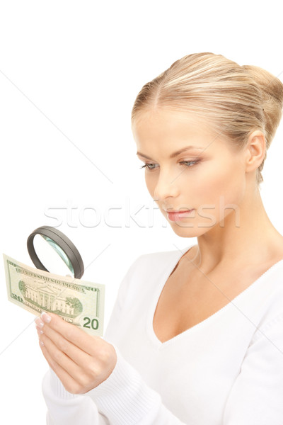 Mulher lupa dinheiro cara feminino branco Foto stock © dolgachov