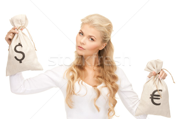 Stock photo: woman with euro and dollar bags