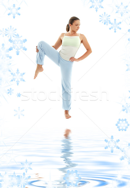 yoga standing on white sand Stock photo © dolgachov