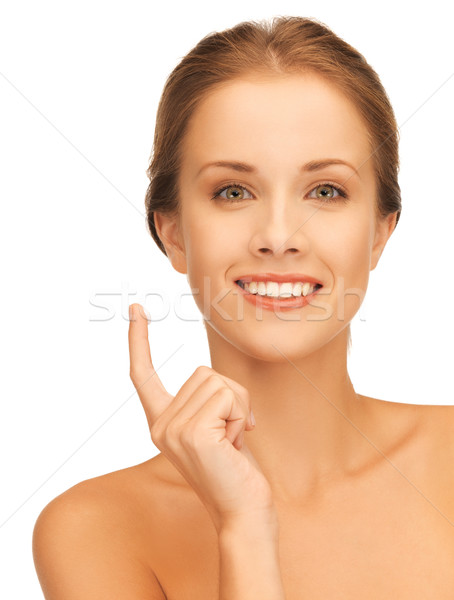 beautiful woman with moisturizing creme drop Stock photo © dolgachov