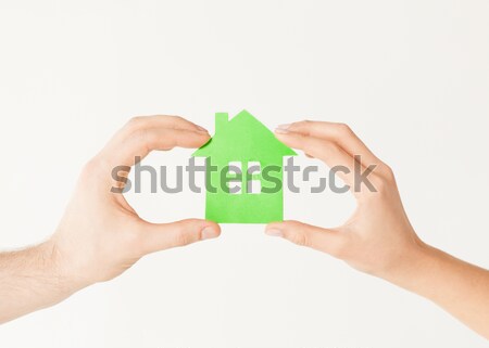 Pár kezek tart üvegház közelkép kép Stock fotó © dolgachov