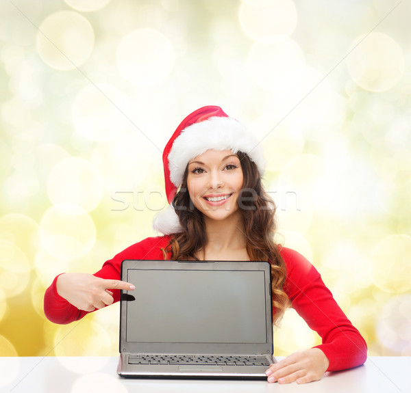 Kobieta Święty mikołaj pomocnik hat laptop christmas Zdjęcia stock © dolgachov