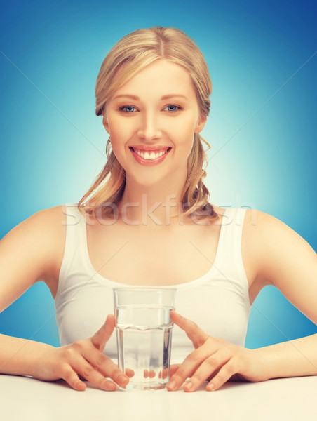 Kadın cam su resim güzel bir kadın mutlu Stok fotoğraf © dolgachov