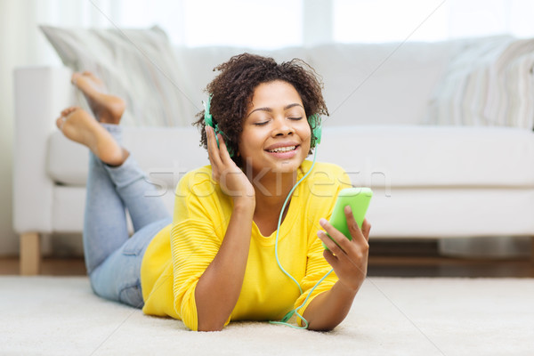 Foto stock: Feliz · África · mujer · auriculares · personas