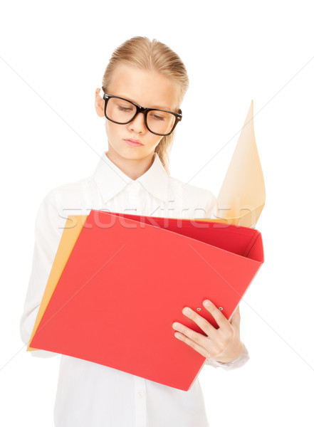 elementary school student with folders  Stock photo © dolgachov