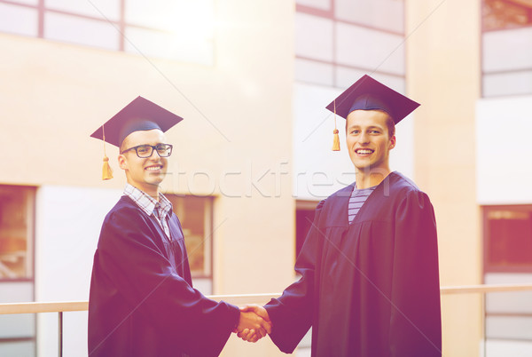 [[stock_photo]]: Souriant · élèves · éducation · graduation · personnes · serrer · la · main