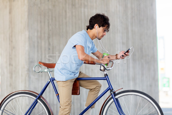 человека смартфон велосипед люди связи Сток-фото © dolgachov