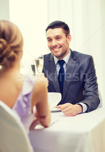 Stockfoto: Paar · bril · champagne · restaurant · vakantie · glimlachend