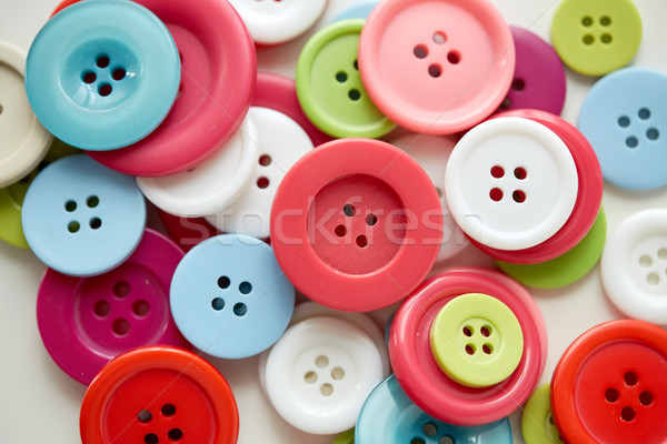 Muchos coser botones costura blanco Foto stock © dolgachov