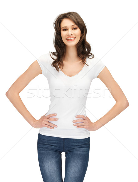 smiling teenage girl in blank white t-shirt Stock photo © dolgachov