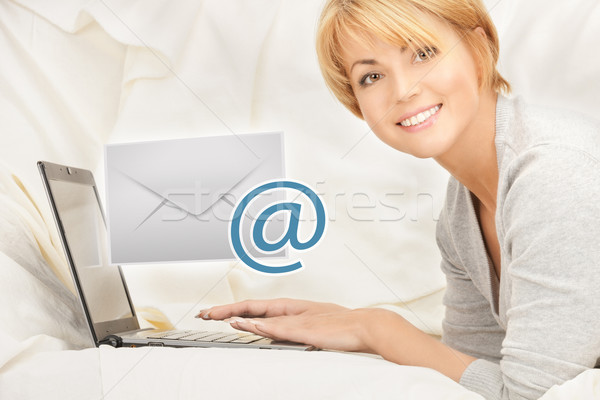 Nő laptop számítógép küldés email közelkép boldog Stock fotó © dolgachov