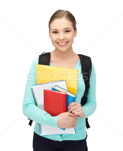 student with books and schoolbag Stock photo © dolgachov