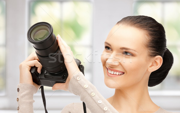 teenage girl with digital camera Stock photo © dolgachov