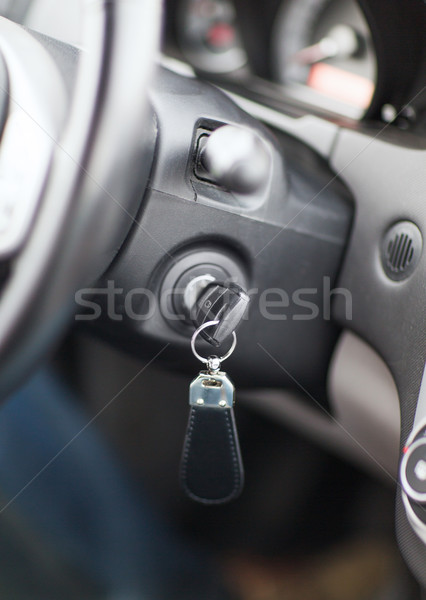 Stock photo: car key in ignition start lock
